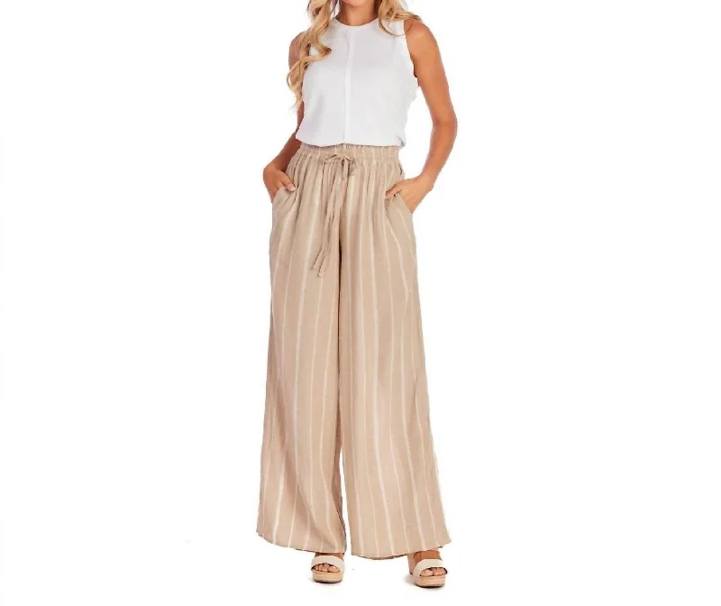 printed trousers for women -Emily Smocked Trousers In Tan